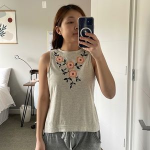 Embellished floral sleeveless blouse